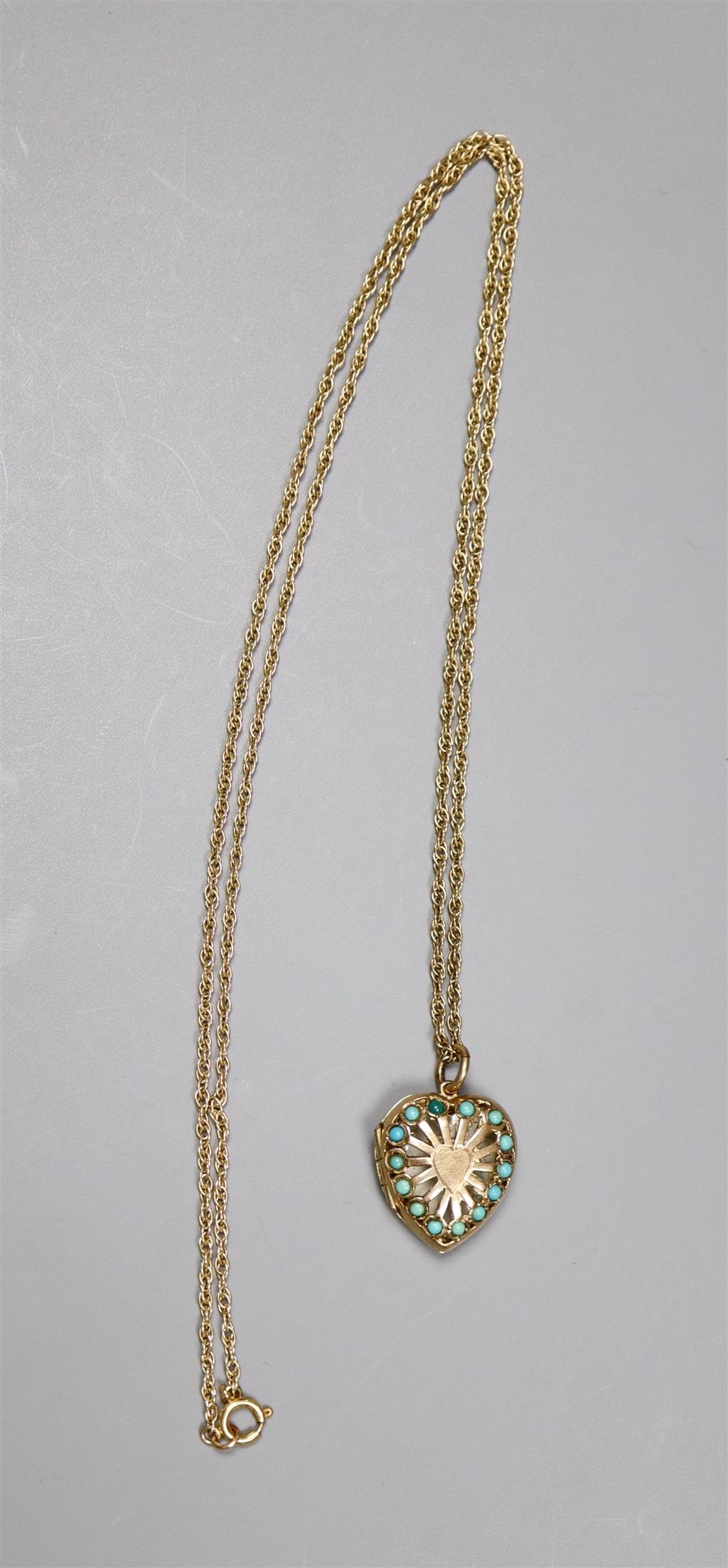 A modern pierced 9ct gold and turquoise set heart shaped locket, on a 9ct chain, gross 8.5 grams & a brooch & pr of earrings.